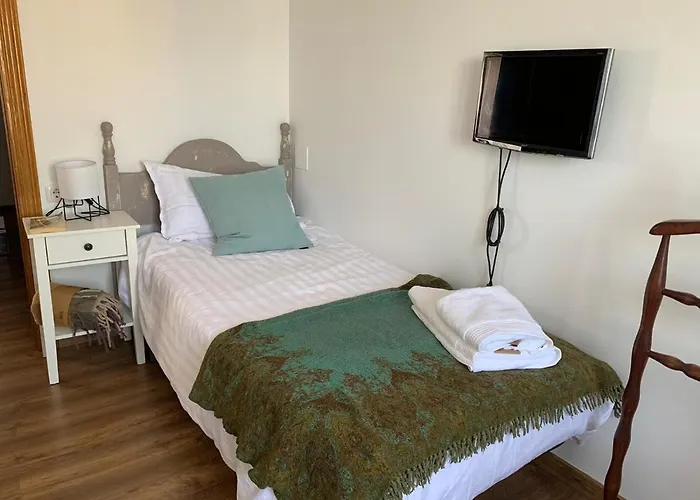 1 Casa de hóspedes *